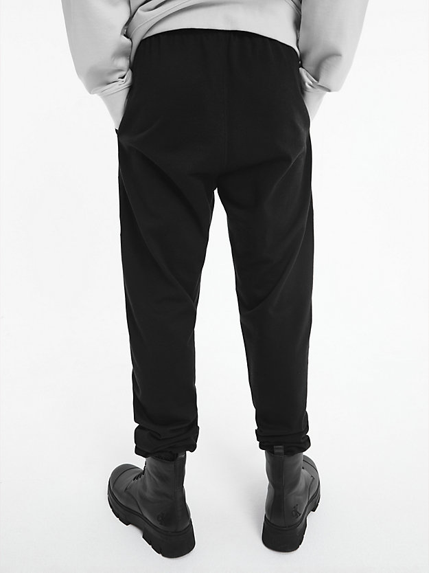 BLACK BEAUTY Swobodne spodnie dresowe unisex - CK Standards dla Unisex CALVIN KLEIN