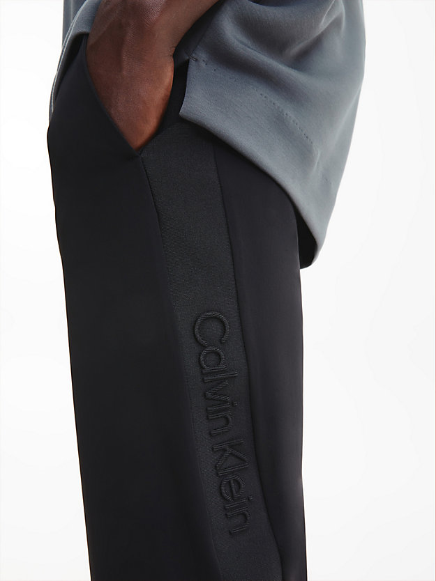 CK BLACK Tapered Stretch Twill Trousers for men CALVIN KLEIN