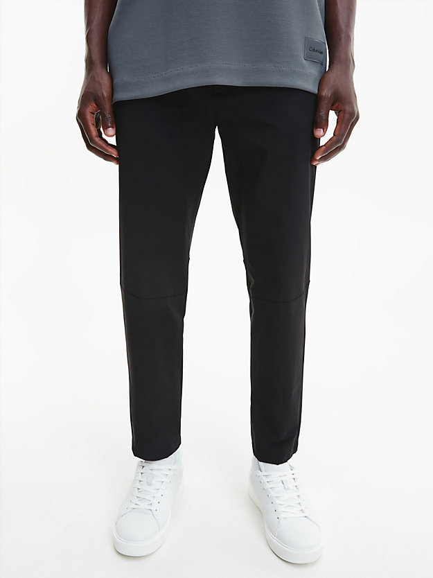 CK BLACK Tapered Stretch Twill Trousers for men CALVIN KLEIN
