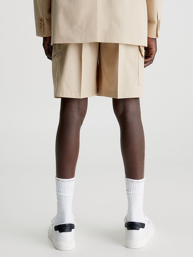 beige relaxed pleated cargo shorts for men calvin klein