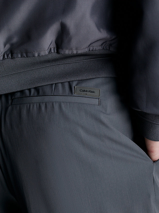 grey relaxed tapered cargo trousers for men calvin klein