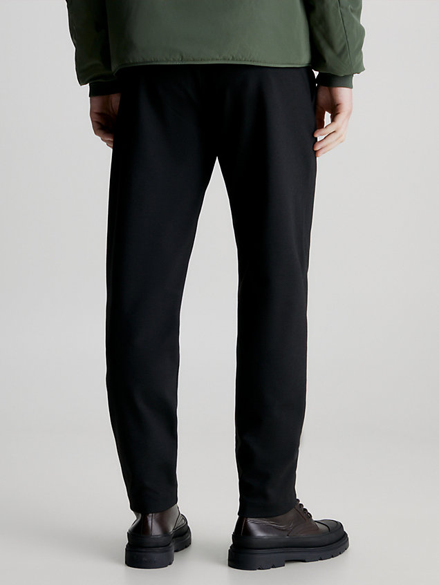 pantalon plissé et fuselé en maille black pour hommes calvin klein