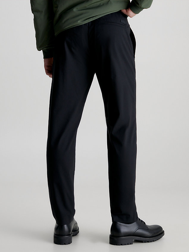 black spodnie dresowe ze stretchem technicznym dla mężczyźni - calvin klein