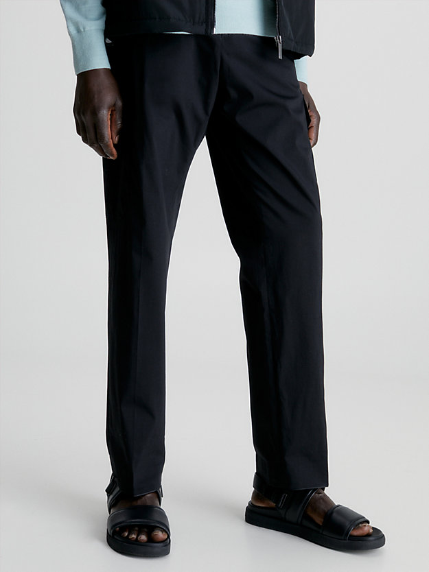 ck black crinkle stretch cargo trousers for men calvin klein