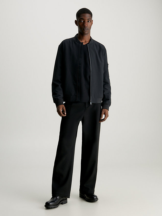 black swobodne spodnie z diagonalu z szerokimi nogawkami dla mężczyźni - calvin klein
