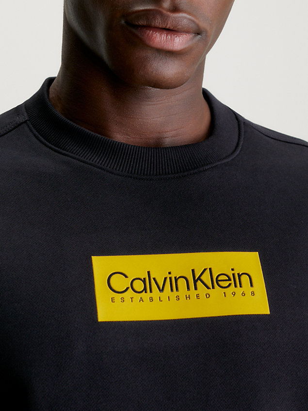 black logo-sweatshirt aus baumwoll-frottee für herren - calvin klein