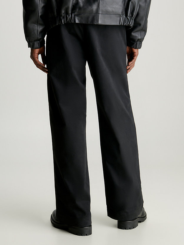 ck black relaxed cotton twill trousers for men calvin klein