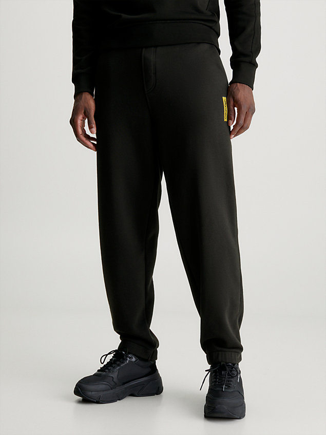 pantalon de jogging relaxed en coton et polaire black pour hommes calvin klein