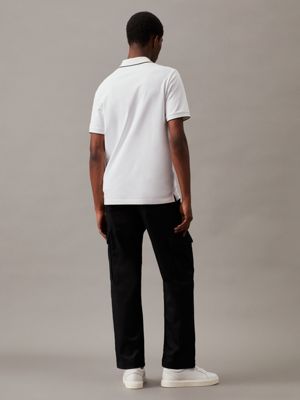 Black pants white polo on sale