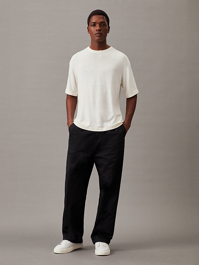 black relaxed seacell pleated trousers for men calvin klein