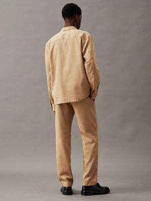 travertine relaxed piece dyed trousers for men calvin klein