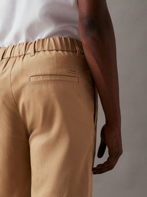 travertine relaxed piece dyed trousers for men calvin klein