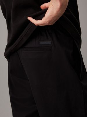 ck black wide leg sateen trousers for men calvin klein