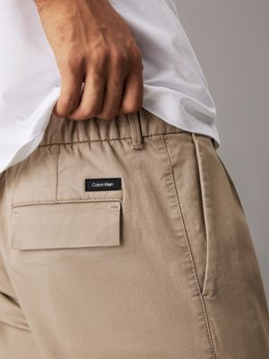 vintage khaki tapered twill pleated trousers for men calvin klein