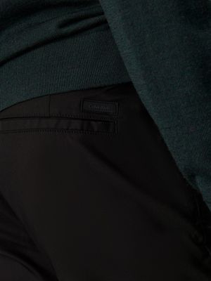 ck black tapered technical stretch trousers for men calvin klein