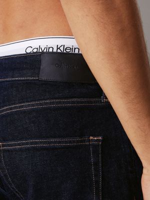 denim rinse tapered jeans for men calvin klein