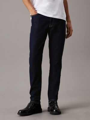 dark blue tapered jeans for men calvin klein