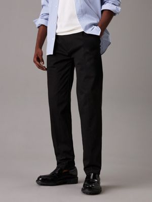 black tapered pleated chino trousers for men calvin klein