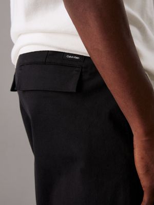 ck black relaxed wide leg trousers for men calvin klein