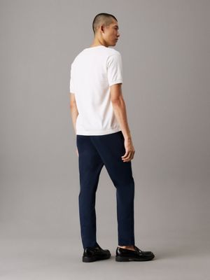 dark sapphire tapered jogger trousers for men calvin klein