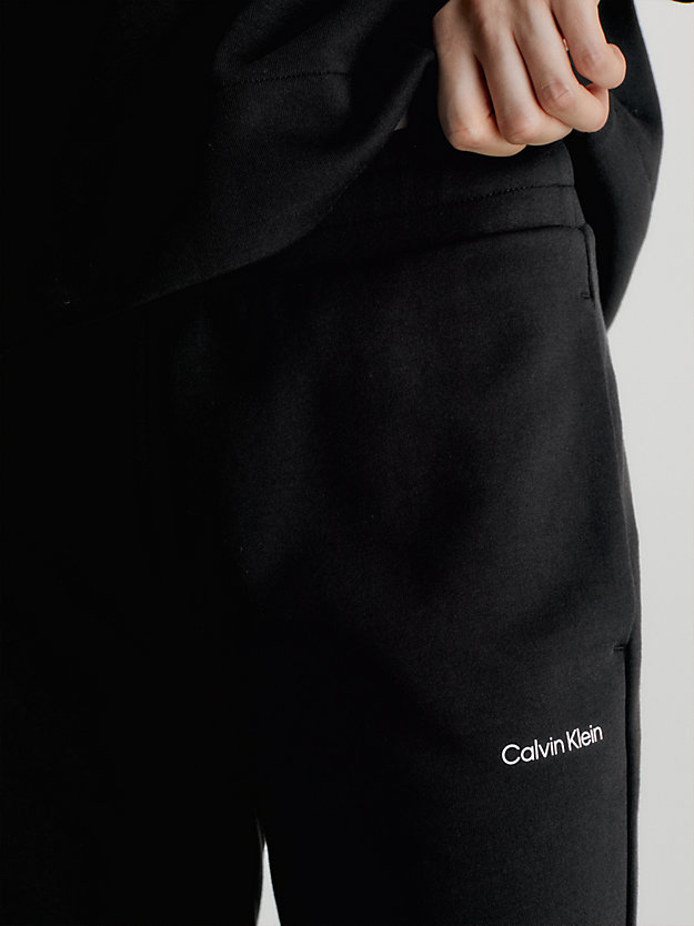 ck black schmale jogginghose mit mikro-logo für damen - calvin klein