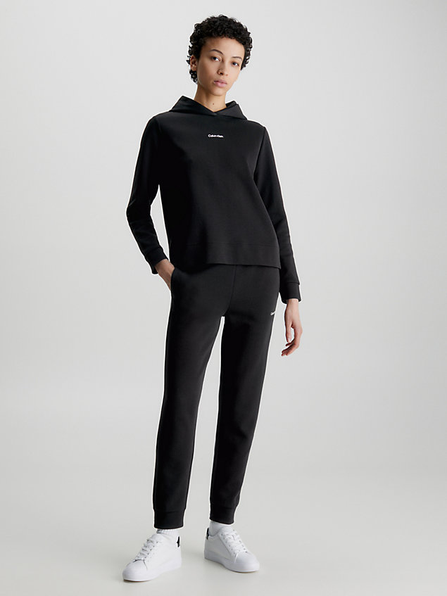 black wąskie spodnie dresowe z małym logo dla kobiety - calvin klein