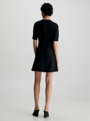 Short black fit hot sale and flare dress