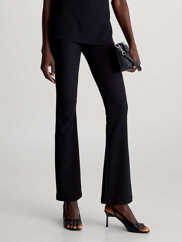black slim flared textured trousers for women calvin klein