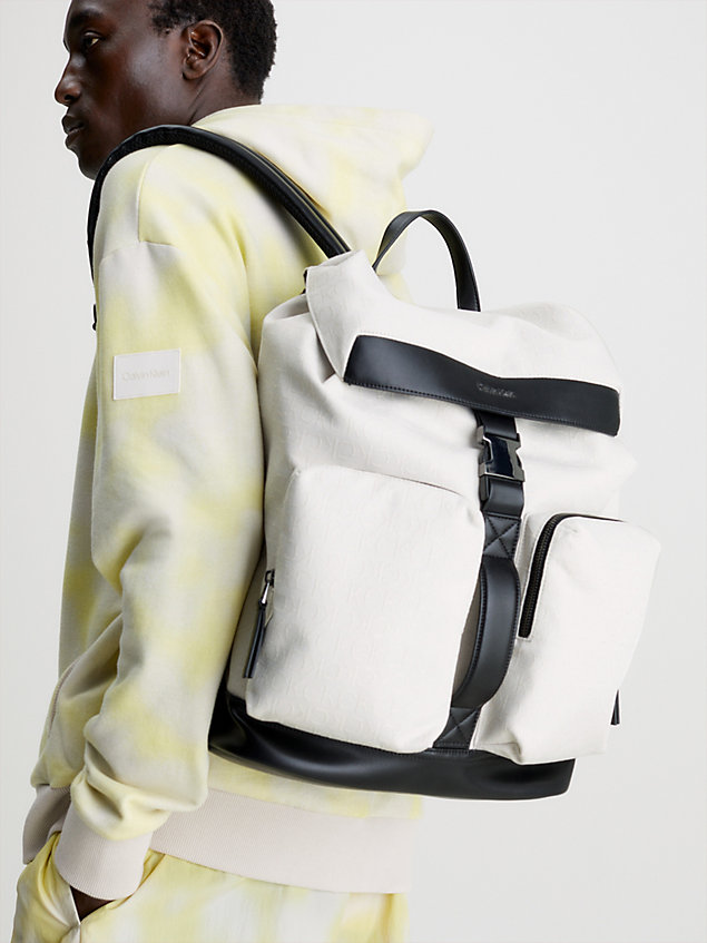 beige recycled logo jacquard backpack for men calvin klein