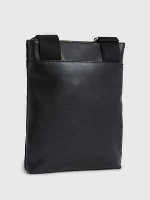 Flat store crossbody bag