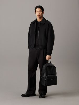 ck black pebble round backpack for men calvin klein