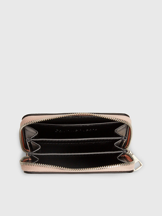 pale conch rfid logo zip around wallet for women calvin klein jeans