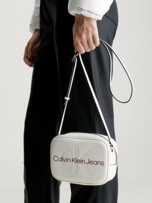 Calvin Klein Jeans industrial logo camera bag in beige