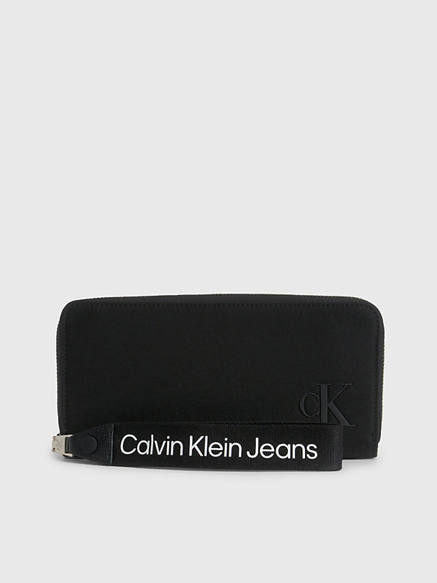 black portemonnaie mit rundum-reißverschluss und handgelenkriemen für damen - calvin klein jeans