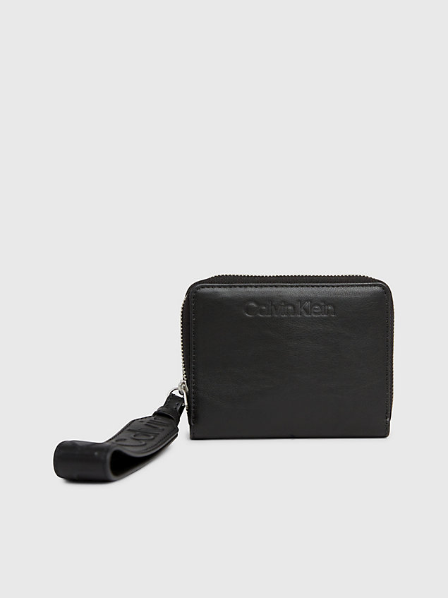 portefeuille zippé anti-rfid avec dragonne black pour femmes calvin klein