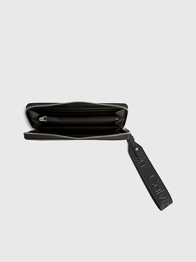 portefeuille zippé anti-rfid avec dragonne ck black pour femmes calvin klein