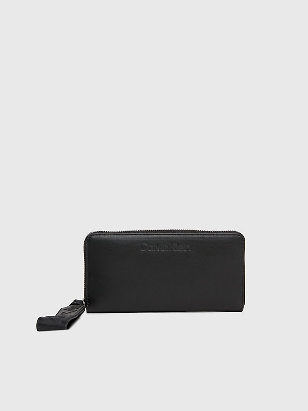 ck black rfid-portemonnaie mit rundum-reißverschluss und handgelenkriemen für damen - calvin klein