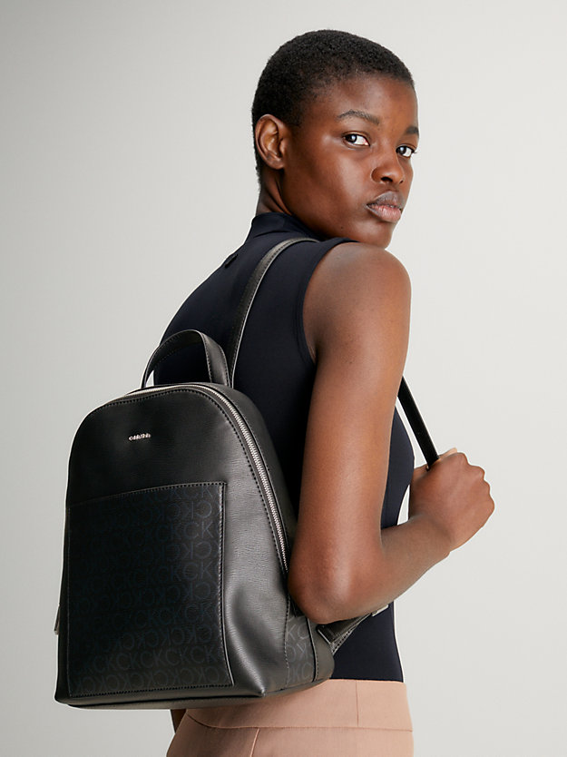 black mono logo round backpack bag for women calvin klein