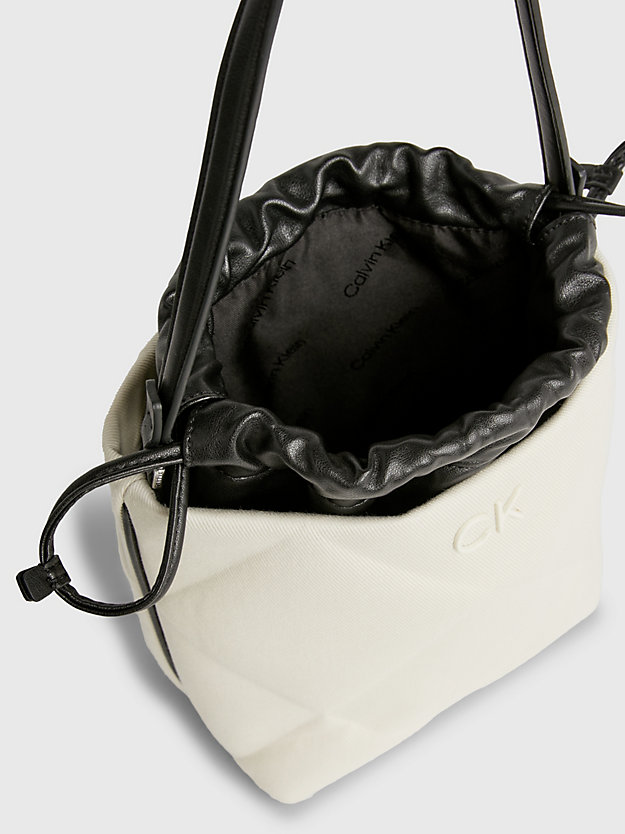 dk ecru canvas quilted canvas 2-in-1 bucket bag for women calvin klein