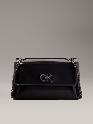 black convertible shiny logo shoulder bag for women calvin klein