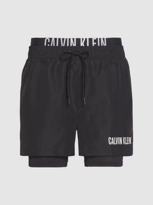 white calvin klein swim shorts