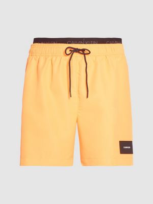 orange calvin klein shorts