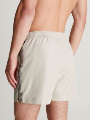 Calvin klein logo on sale tape swim shorts