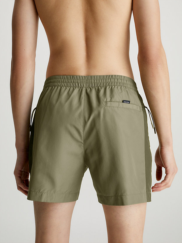 DELTA GREEN Medium Drawstring Swim Shorts - Core Solids for men CALVIN KLEIN