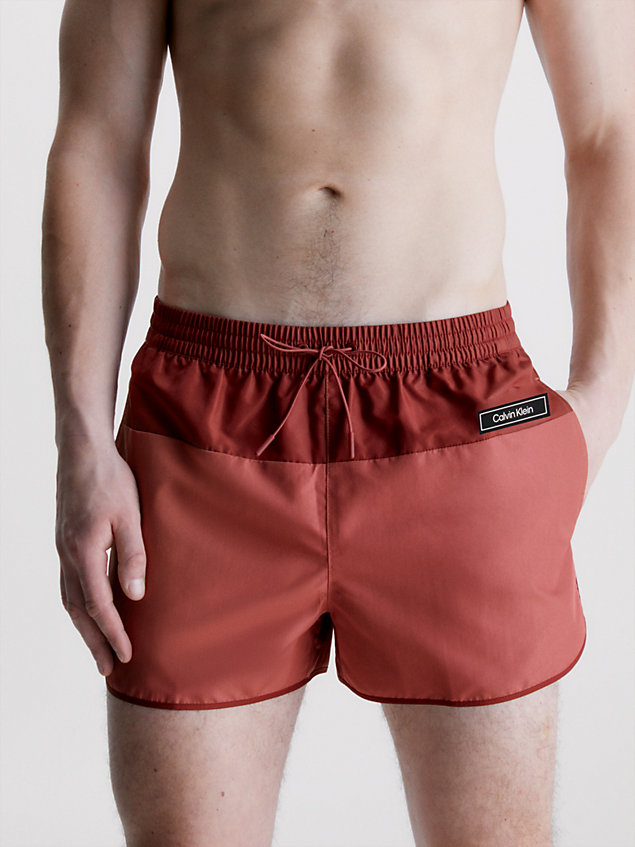 red short runner swim shorts - core solids for men calvin klein