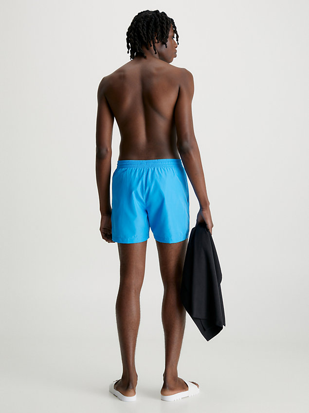 blue swim shorts and towel gift pack for men calvin klein