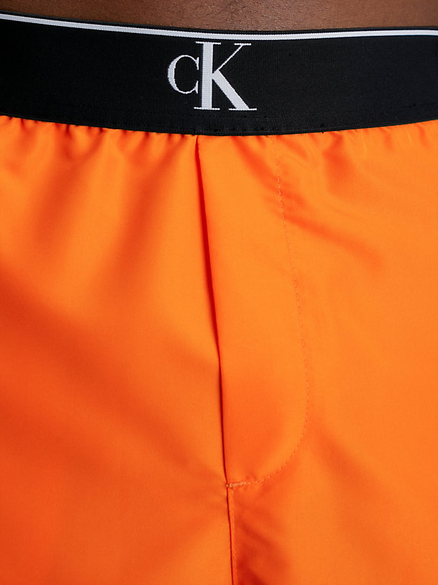 SUN KISSED ORANGE Swim Shorts - CK Monogram for men CALVIN KLEIN