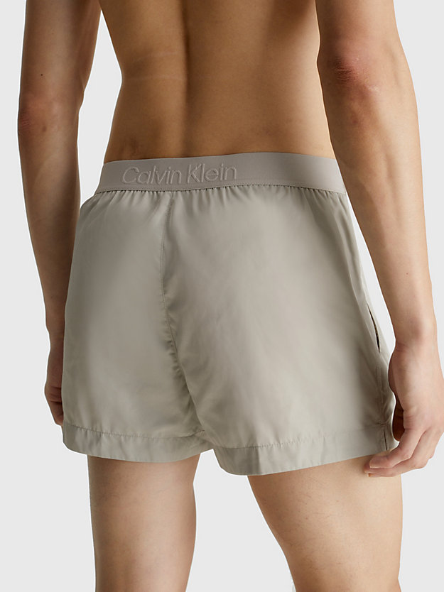 FRENCH TAUPE Logo Waistband Swim Shorts - Core Tonal for men CALVIN KLEIN