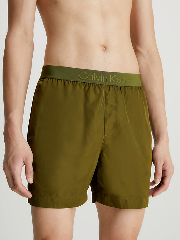 tropical fern logo waistband swim shorts - core tonal for men calvin klein
