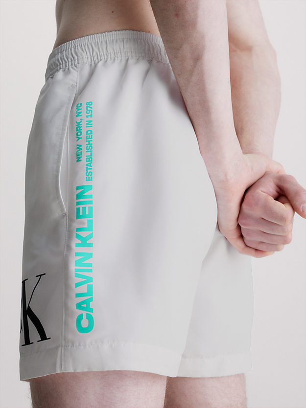 PVH CLASSIC WHITE Medium Drawstring Swim Shorts - CK Monogram for men CALVIN KLEIN